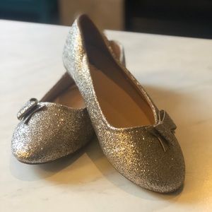 Gold glitter flats with bow